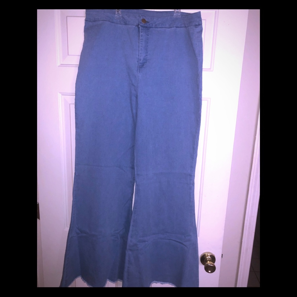 Wide legged blue jean bell bottoms